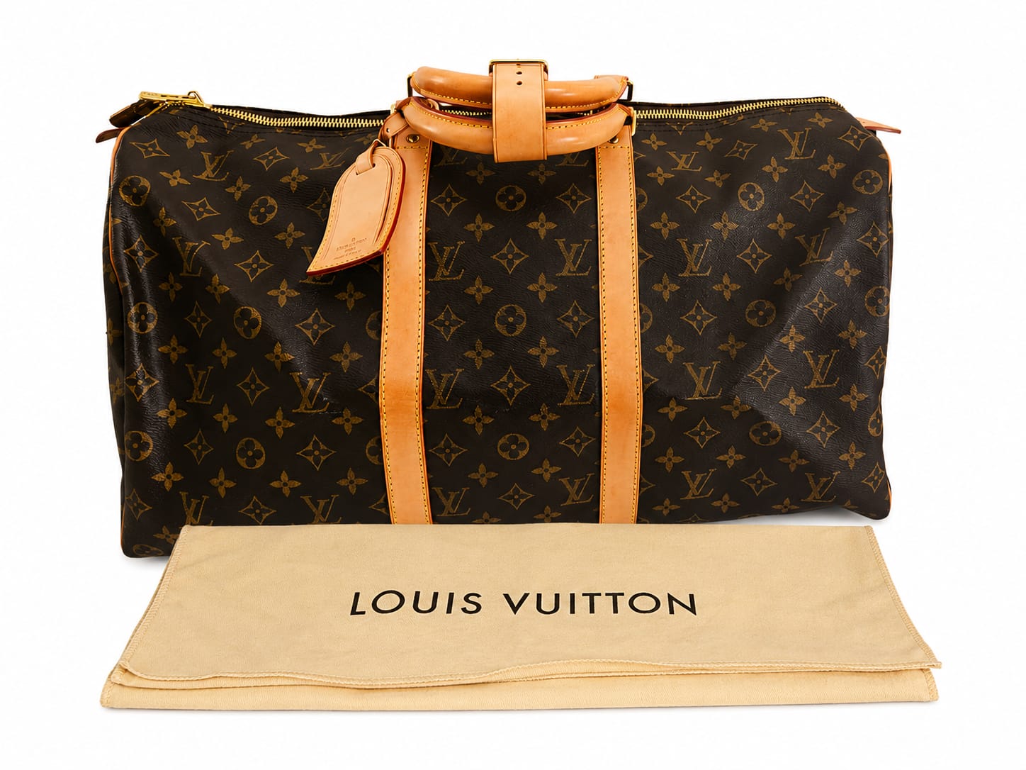 Louis Vuitton Keepall 50 in Monogram Coated Canvas, Natural Vachetta Leather Trim, Gold-Tone Hardware — sold from the Lux D'Oré archive