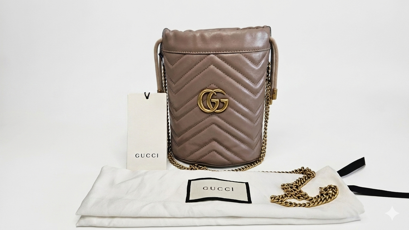 Gucci GG Marmont Matelassé Leather Bucket Bag in Dusty Pink Matelassé Chevron Quilted Leather, Antique Gold-Tone Hardware