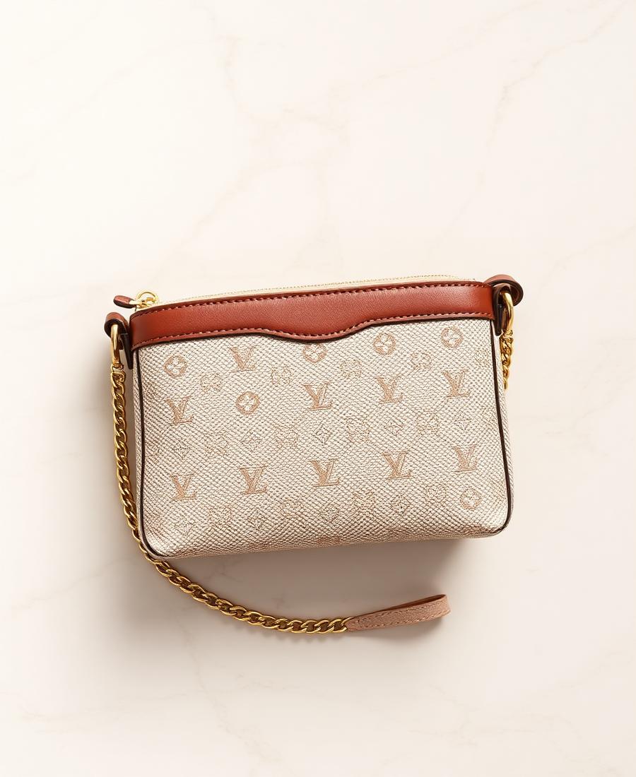 Louis Vuitton Mini Pochette Accessoires in Monogram Canvas, Vachetta Trim